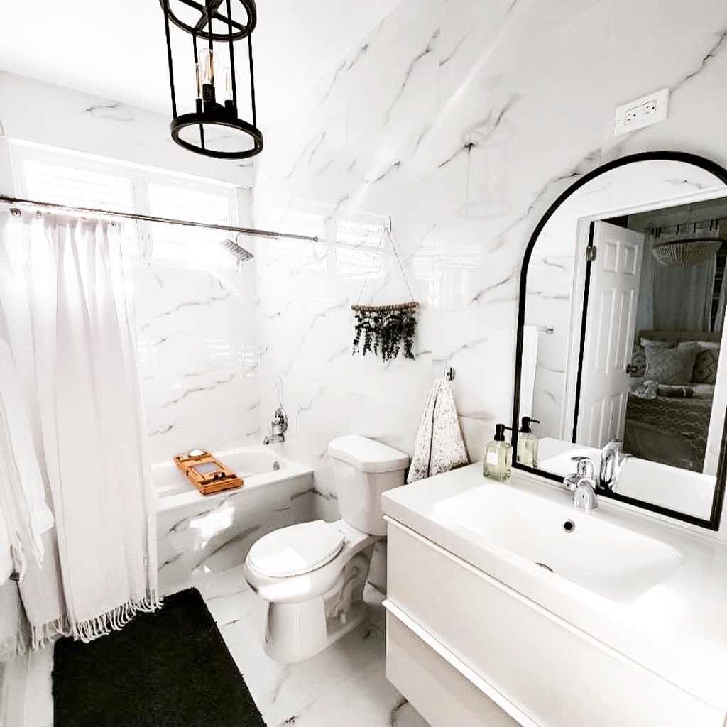 Marble Bathroom with Black Pendant Light